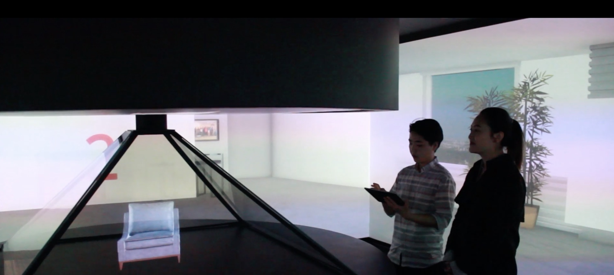 People using a holographic room installation